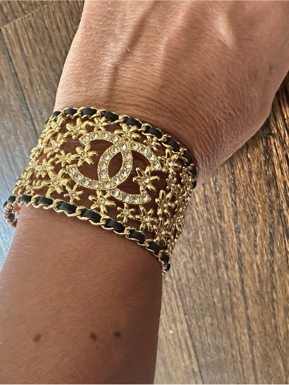 CHANEL Gold Crystal CC Filigree Cuff Bracelet with Black Leather Weave - Picture 4 of 5
